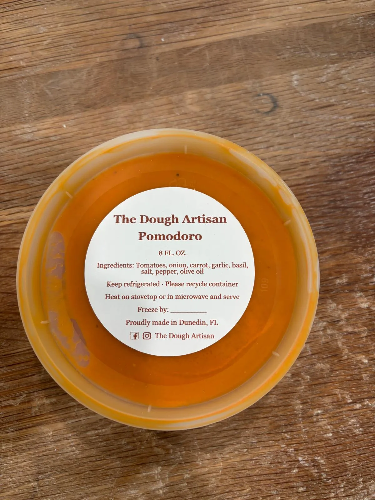 The Dough Artisan Pomodoro sauce in an 8 fluid ounce container